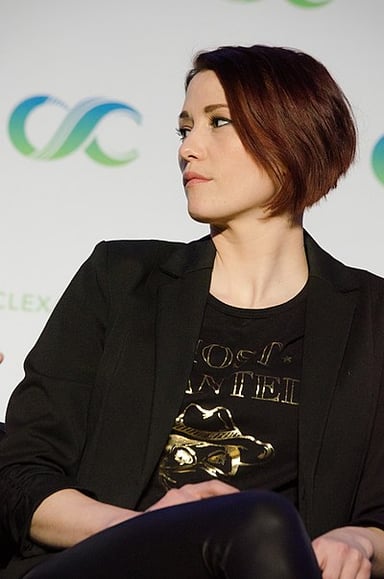 In which DC Comics superhero series did Chyler Leigh have a role?