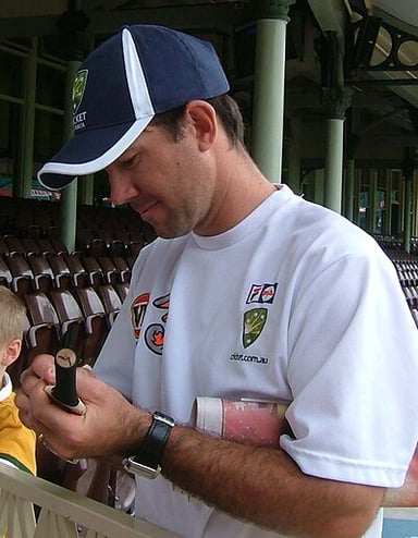 What is Ricky Ponting's position in the list of cricketers by number of international centuries scored?