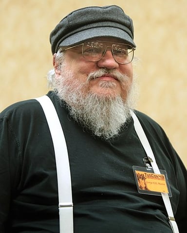 In which year was George R. R. Martin included in Time 100 list of the most influential people?