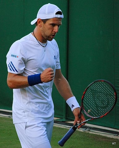 Who did Melzer win the men's doubles title with at the 2011 US Open?