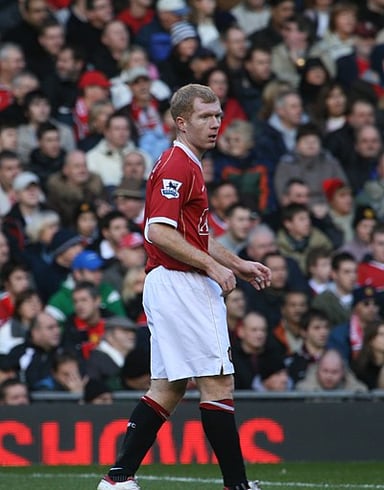 Which club is Scholes a co-owner of?
