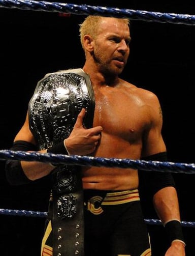 What was the reason for Christian Cage's retirement in 2014?