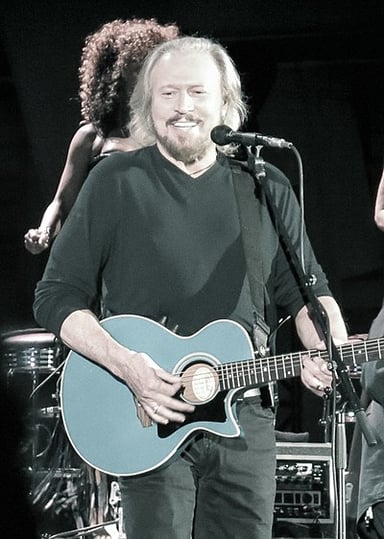 Which magazine ranked Barry Gibb number 38 on its list of the "100 Greatest Singers"?