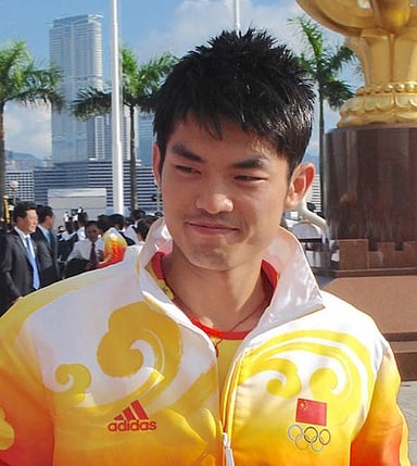 Against which player did Lin Dan win his second Olympic gold medal?