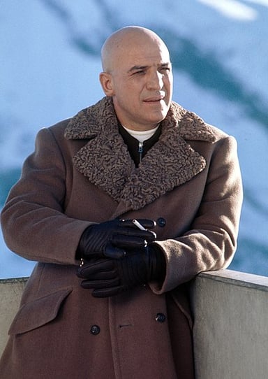 In which comedy war film does Telly Savalas plan a heist behind enemy lines?