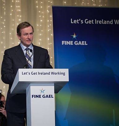 When did Enda Kenny lead Fine Gael to a historic victory? 