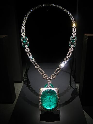 Which famous gemstone was acquired by Cartier in 1911?