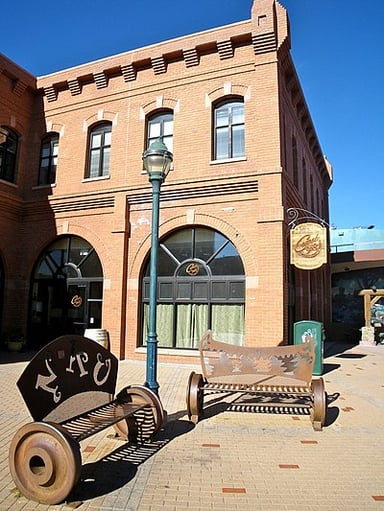 What was the local industry in Flagstaff before Route 66 passed through the city?