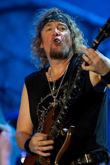 Which band did Adrian Smith form after leaving Iron Maiden in 1990?