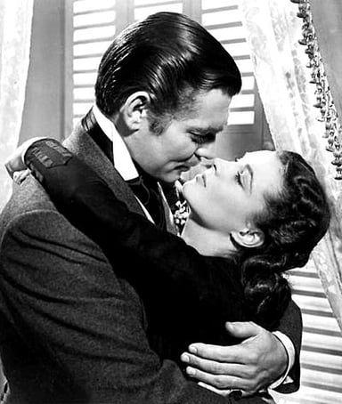 Which actress did Clark Gable work with in three films?