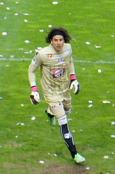 In which European country did Guillermo Ochoa first play club football?