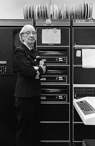 Which military ship was named in Grace Hopper's honor?