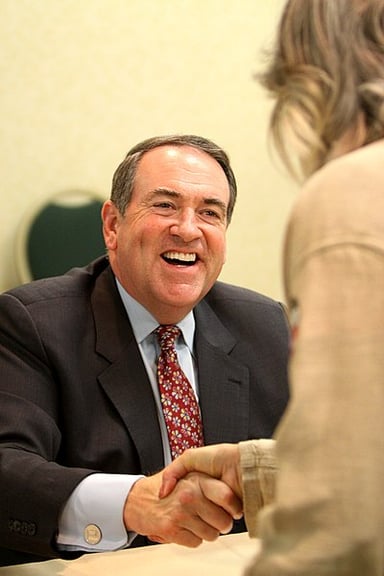 On which channel did Huckabee's talk show first air?