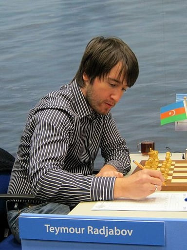 Which former world number one player did Radjabov beat in 2003?