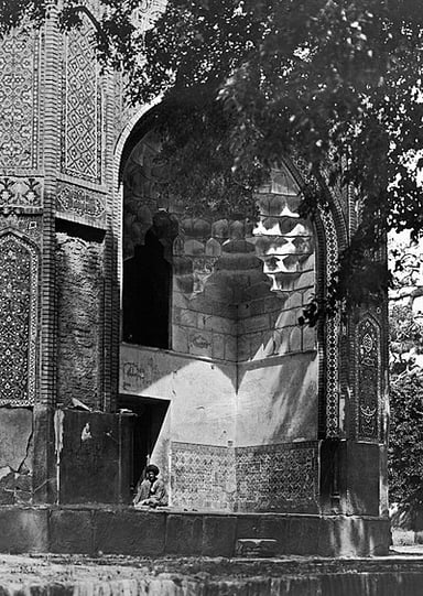 Which famous Persian poet and mystic is also buried in Nishapur?