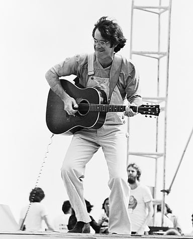 Which popular music festival did John Sebastian famously perform at in 1969?