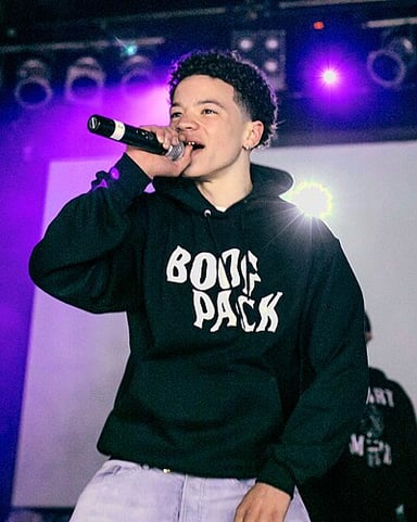 What is Lil Mosey's core music style?