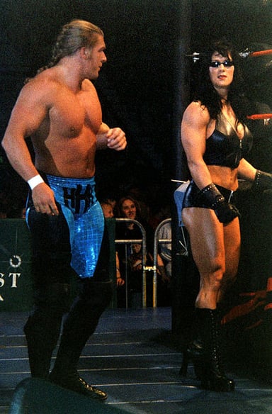 Which promotion was Chyna associated with in 1997?
