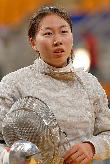 For how many years has Shen Chen been fencing professionally?