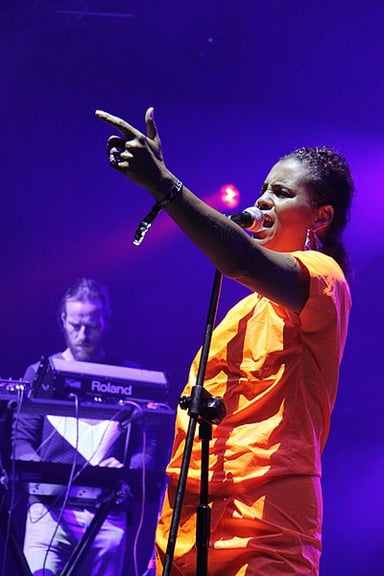 What is Neneh Cherry known for in addition to singing?