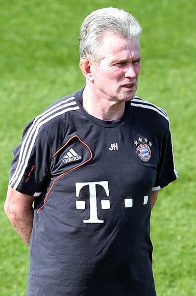 Which team did Heynckes manage to a UEFA Champions League win in 1997-98?