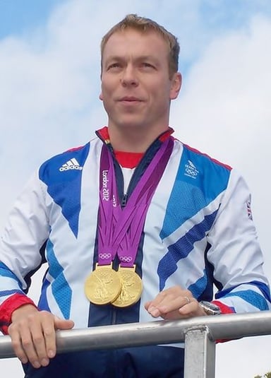 To whom did Chris Hoy cede the record as the most successful British Olympian in 2021?