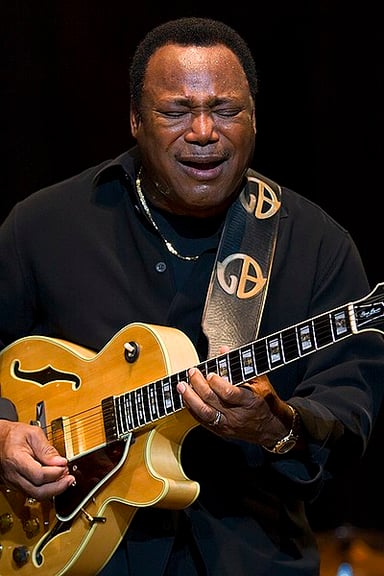 How would you describe George Benson's music style?