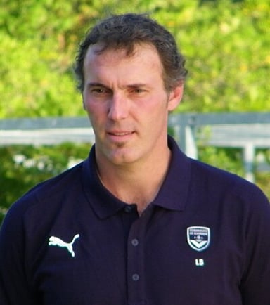 Which football club first saw Laurent Blanc as a professional manager?
