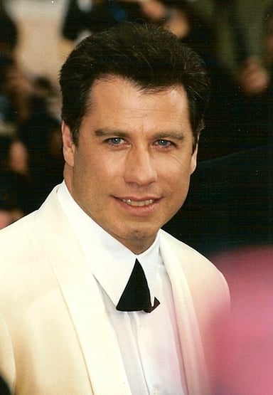 In which 2007 musical film did John Travolta play a female character?