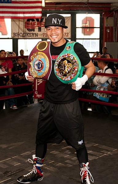 From what weight class was Donaire's featherweight title?