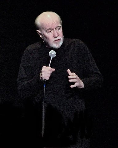 What was George Carlin's nickname in the comedy world?