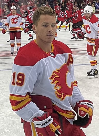 What position does Matthew Tkachuk play in ice hockey?