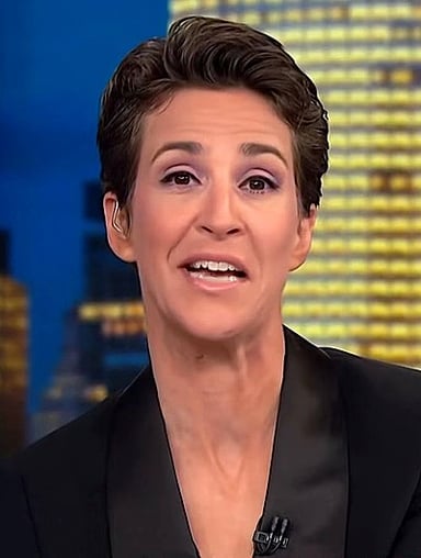 Does Rachel Maddow identify as liberal or conservative?