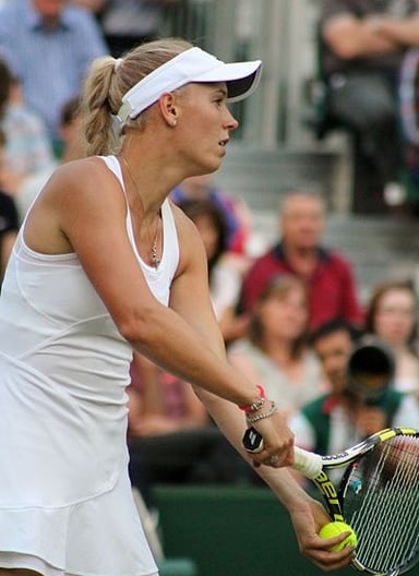 When did Caroline Wozniacki retire from professional tennis?