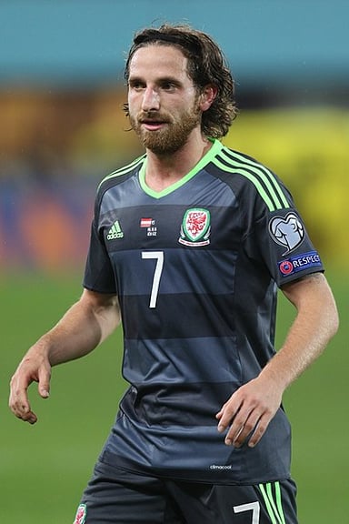 At what age did Joe Allen make his first-team debut?