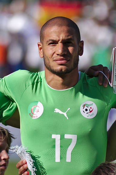 What position does Adlène Guedioura play in football?
