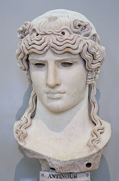 What deity was Antinous merged with in the cult established by Hadrian?