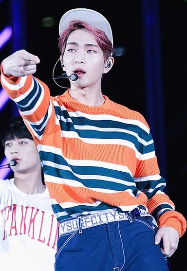 What position does Onew hold in SHINee?