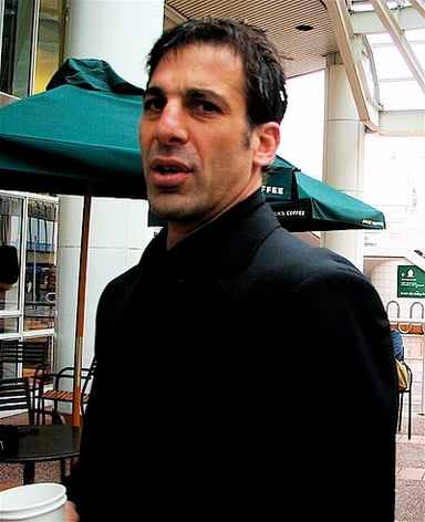 What is the nationality of Chris Chelios?