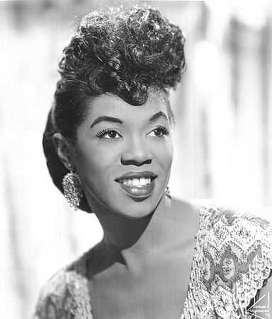 What genre of music is Sarah Vaughan famously associated with?