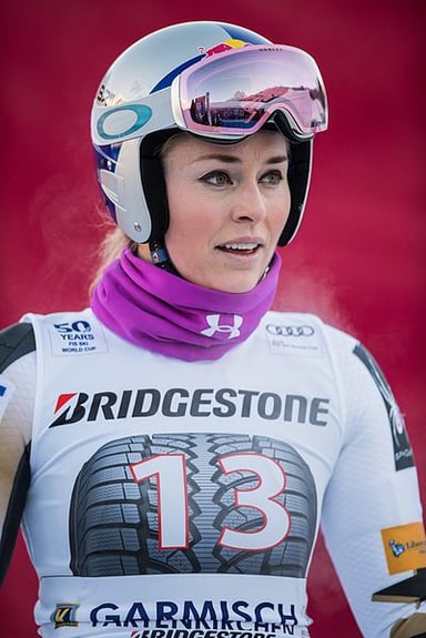 Lindsey surpassed which male skier in World Cup titles?
