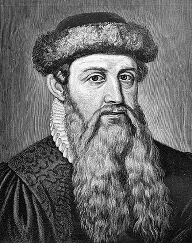 What did Gutenberg use to press the ink onto the paper?