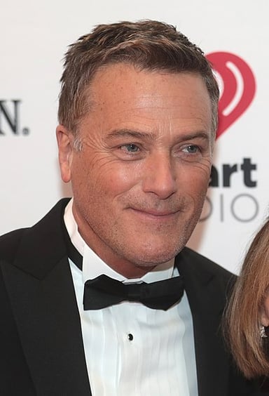 Which instrument is Michael W. Smith best known for playing?