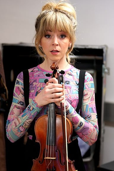 Who did Lindsey Stirling collaborate with for a cover version of "Radioactive"?