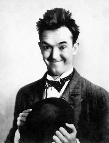 Who was the comedy partner of Stan Laurel in movies?