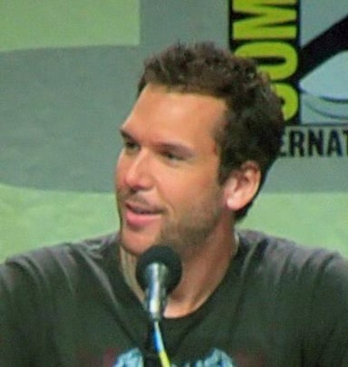 What genre does Dane Cook's filmography primarily belong to?