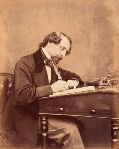 What is the religion or worldview of Charles Dickens?