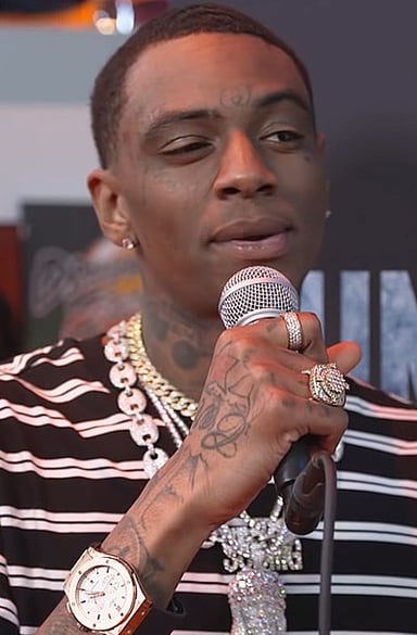 Which other artist did Soulja Boy sign?