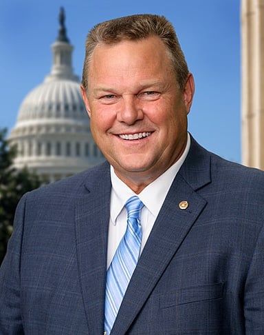 What is Jon Tester's profession, aside from politics?