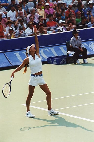 What year did Anna Kournikova win her first Australian Open doubles title?